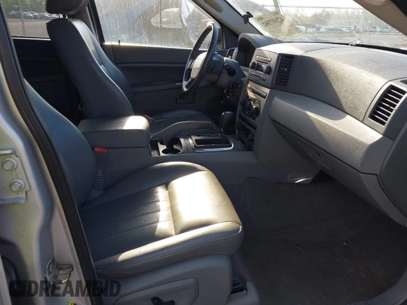 2005 Jeep Grand Cherokee Laredo with VIN 1J8GS48K35C591154, listed as a IAAI auction lot 42107302 with 196,237 mi miles and . Bid and sale history available at DreamBid. Image 5.