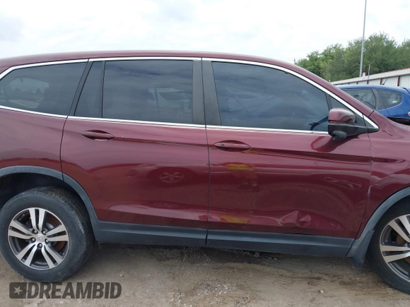 2018 Honda Pilot EX-L with VIN 5FNYF5H59JB030003, listed as a IAAI auction lot 42358798 with Not provided miles and . Bid and sale history available at DreamBid. Image 13.
