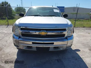 2013 Chevrolet Silverado 1500 LT with VIN 3GCPKSE71DG203443, listed as a IAAI auction lot 42033447 with 128,904 mi miles. Bid and sale history available at carsss.com. Image 6.