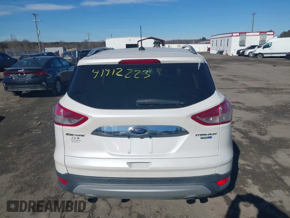 2016 Ford Escape Titanium with VIN 1FMCU9J96GUB65441, listed as a IAAI auction lot 41412223 with 74,218 mi miles. Bid and sale history available at carsss.com. Image 16.