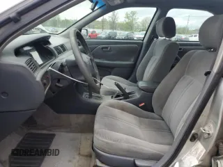 2001 Toyota Camry CE z VIN 4T1BG22K71U847635, wystawiony jako Copart lot #53729415 z przebiegiem 176 347 mil mil oraz Nie do naprawy • Non repairable. Historia ofert i sprzedaży dostępna na DreamBid. Obrazek 7.