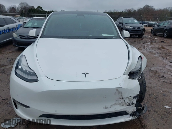 2021 Tesla Model Y Standard Range with VIN 5YJYGDED8MF114076, listed as a IAAI auction lot 41567295 with 150,133 mi miles and . Bid and sale history available at DreamBid. Image 11.