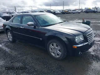2006 Chrysler 300 C with VIN 2C3LK63H66H437280, listed as a IAAI auction lot 41615050 with 209,303 mi miles. Bid and sale history available at carsss.com. Image 1.