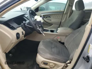 2015 Ford Taurus SE with VIN 1FAHP2D84FG149799, listed as a Copart auction lot 88993345 with 114,131 mi miles and Salvage Title. Bid and sale history available at DreamBid. Image 7.