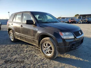 2007 Suzuki Grand Vitara with VIN JS3TE941474202110, listed as a Copart auction lot 77774424 with 131,717 mi miles and Salvage title. Bid and sale history available at DreamBid. Image 4.