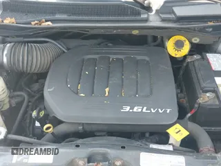 2013 Dodge Grand Caravan SE with VIN 2C4RDGBG9DR799528, listed as a IAAI auction lot 42894435 with 142,036 mi miles and . Bid and sale history available at DreamBid. Image 20.