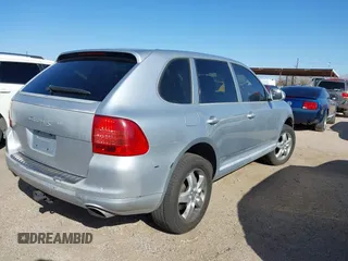 2005 Porsche Cayenne S with VIN WP1AB29P75LA62851, listed as a IAAI auction lot 41685787 with 143,711 mi miles. Bid and sale history available at carsss.com. Image 4.