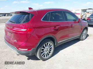 2015 Lincoln MKC with VIN 5LMCJ1A93FUJ30944, listed as a IAAI auction lot 41835261 with 142,324 mi miles. Bid and sale history available at carsss.com. Image 4.
