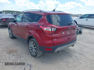 2018 Ford Escape Titanium with VIN 1FMCU0J96JUD58854, listed as a IAAI auction lot 42590609 with 77,825 mi miles and . Bid and sale history available at DreamBid. Image 3.