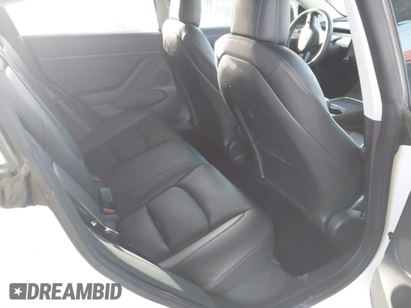 2022 Tesla Model 3 Long Range with VIN 5YJ3E1EB1NF236969, listed as a IAAI auction lot 41525117 with 24,215 mi miles and . Bid and sale history available at DreamBid. Image 8.