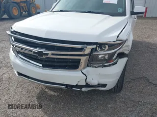 2017 Chevrolet Tahoe LT with VIN 1GNSKBKCXHR350028, listed as a IAAI auction lot 41684954 with 117,261 mi miles and . Bid and sale history available at DreamBid. Image 6.