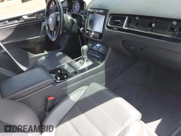 2013 Volkswagen Touareg Sport с VIN WVGEP9BP4DD013215, выставлен на аукционе IAAI как лот 42154801 с пробегом 159 556 миль миль и . История ставок и продаж доступна на DreamBid. Изображение 5.