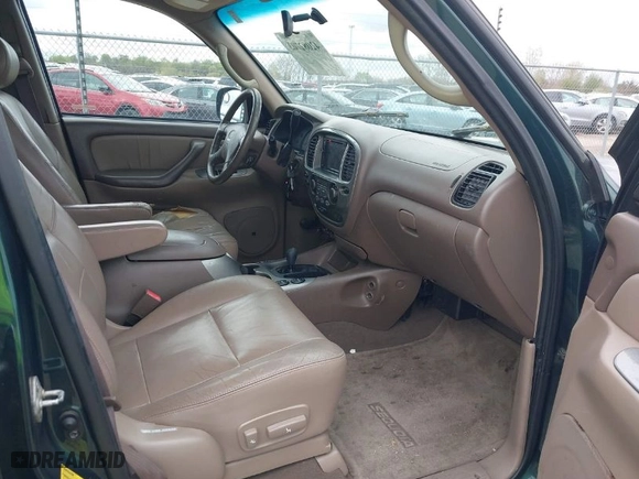 2001 Toyota Sequoia Limited with VIN 5TDBT48A61S040585, listed as a IAAI auction lot 42082703 with 263,203 mi miles. Bid and sale history available at carsss.com. Image 5.