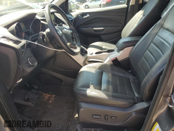 2013 Ford Escape SEL with VIN 1FMCU9HX1DUC79086, listed as a Copart auction lot 57312515 with 124,928 mi miles and Salvage title. Bid and sale history available at DreamBid. Image 7.