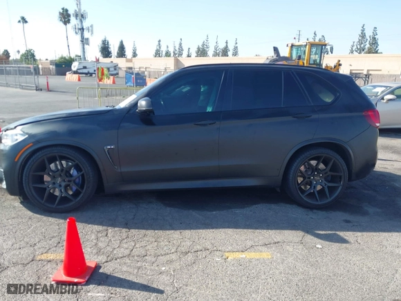 2016 BMW X5 M with VIN 5YMKT6C51G0R79331, listed as a IAAI auction lot 40590865 with 80,772 mi miles. Bid and sale history available at carsss.com. Image 14.