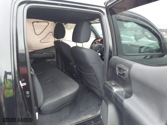 2019 Toyota Tacoma 4WD SR with VIN 3TMCZ5AN1KM247618, listed as a IAAI auction lot 41734570 with 68,796 mi miles. Bid and sale history available at carsss.com. Image 8.