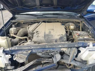 2015 Toyota Tacoma with VIN 3TMMU4FN0FM077148, listed as a IAAI auction lot 41274934 with 112,617 mi miles and . Bid and sale history available at DreamBid. Image 10.