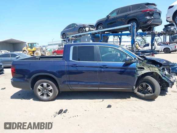 2020 Honda Ridgeline RTL with VIN 5FPYK3F56LB028917, listed as a IAAI auction lot 42280770 with 17,598 mi miles and . Bid and sale history available at DreamBid. Image 13.