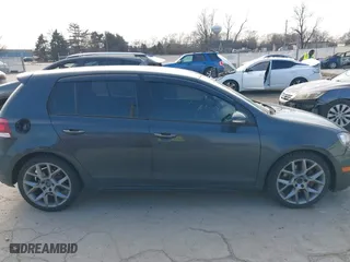 2013 Volkswagen GTI with VIN WVWHV7AJ2DW129476, listed as a IAAI auction lot 41716090 with 132,996 mi miles. Bid and sale history available at carsss.com. Image 14.