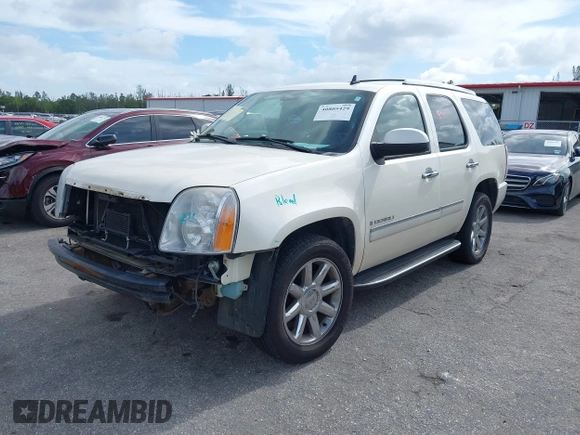 2009 GMC Yukon Denali z VIN 1GKFK032X9R236556, wystawiony jako IAAI lot #40805429 z przebiegiem 183 042 mil mil oraz . Historia ofert i sprzedaży dostępna na DreamBid. Obrazek 2.