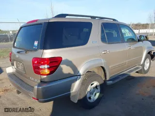 2002 Toyota Sequoia SR5 with VIN 5TDBT44A12S126037, listed as a IAAI auction lot 41832601 with 164,099 mi miles. Bid and sale history available at carsss.com. Image 4.