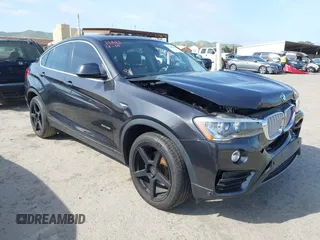 2015 BMW X4 xDrive28i z VIN 5UXXW3C54F0M87412, wystawiony jako IAAI lot #42038938 z przebiegiem 106 461 mil mil oraz . Historia ofert i sprzedaży dostępna na DreamBid. Obrazek 1.
