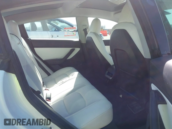 2021 Tesla Model 3 Long Range z VIN 5YJ3E1EB0MF860289, wystawiony jako IAAI lot #41771854 z przebiegiem 190 892 mil mil oraz . Historia ofert i sprzedaży dostępna na DreamBid. Obrazek 8.