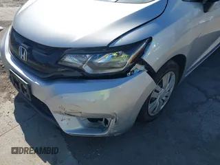 2015 Honda Fit LX z VIN 3HGGK5H51FM750102, wystawiony jako IAAI lot #42278830 z przebiegiem 121 855 mil mil oraz . Historia ofert i sprzedaży dostępna na DreamBid. Obrazek 6.