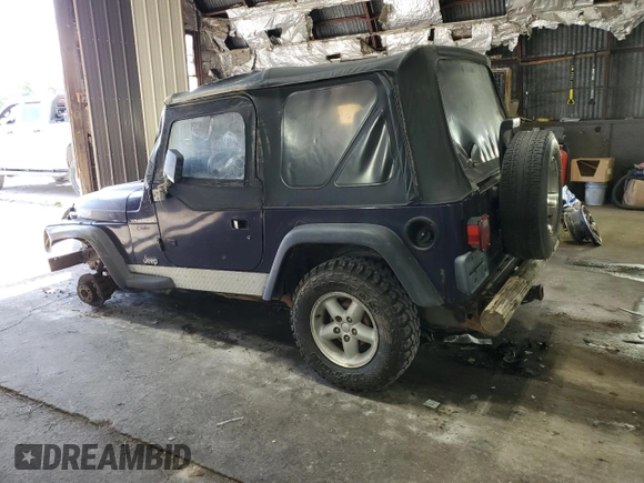 1998 Jeep Wrangler SE with VIN 1J4FY29P4WP792159, listed as a Copart auction lot 73400054 with 0 mi miles and Salvage Title. Bid and sale history available at carsss.com. Image 2.