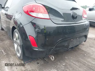 2013 Hyundai Veloster w/Black Int with VIN KMHTC6AD7DU170049, listed as a IAAI auction lot 42441737 with 101,924 mi miles and . Bid and sale history available at DreamBid. Image 6.