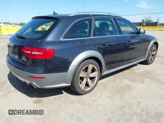 2014 Audi allroad A4 Premium Plus z VIN WA1UFAFL1EA151304, wystawiony jako IAAI lot #42387022 z przebiegiem 98 225 mil mil oraz . Historia ofert i sprzedaży dostępna na DreamBid. Obrazek 4.