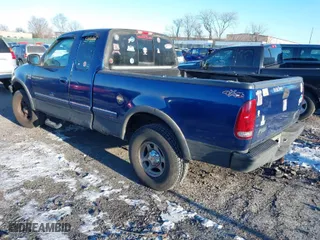 1998 Ford F-150 Standard with VIN 1FTZX18WXWNB31384, listed as a IAAI auction lot 41246304 with 163,877 mi miles. Bid and sale history available at carsss.com. Image 3.