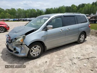 2007 Honda Odyssey EX-L with VIN 5FNRL38657B059033, listed as a Copart auction lot 54005495 with 212,674 mi miles and Salvage Title. Bid and sale history available at DreamBid. Image 1.