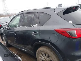 2014 Mazda CX-5 Touring with VIN JM3KE2CY2E0407453, listed as a IAAI auction lot 41564916 with 104,852 mi miles. Bid and sale history available at carsss.com. Image 13.