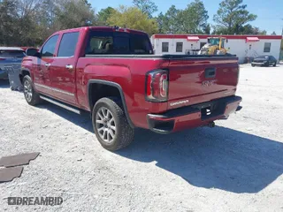 2018 GMC Sierra 1500 Denali with VIN 3GTU2PEJ9JG172983, listed as a IAAI auction lot 41784319 with 74,025 mi miles. Bid and sale history available at carsss.com. Image 3.