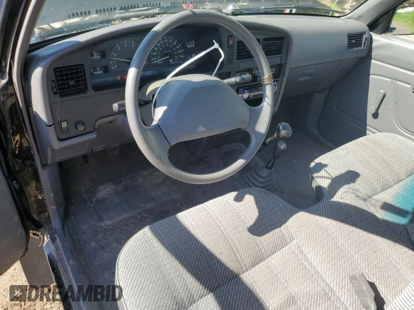 1994 Toyota Pickup DX z VIN JT4RN01P8R7065882, wystawiony jako Copart lot #56998705 z przebiegiem 86 406 mil mil oraz Czysty tytuł • Clean title. Historia ofert i sprzedaży dostępna na DreamBid. Obrazek 8.