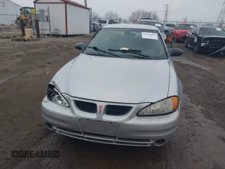 2003 Pontiac Grand Am SE1 with VIN 1G2NF52E43M684966, listed as a IAAI auction lot 41534135 with 91,049 mi miles. Bid and sale history available at carsss.com. Image 12.