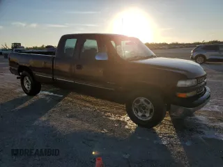 2001 Chevrolet Silverado 1500 LS with VIN 1GCEC19VX1E284081, listed as a Copart auction lot 85853514 with 210,136 mi miles and Salvage Title. Bid and sale history available at DreamBid. Image 4.