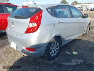 2014 Hyundai Accent GS with VIN KMHCT5AE4EU159319, listed as a IAAI auction lot 41896989 with 204,453 mi miles. Bid and sale history available at carsss.com. Image 4.