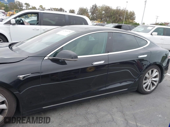 2017 Tesla Model S 100D with VIN 5YJSA1E26HF197176, listed as a IAAI auction lot 42565791 with 120,287 mi miles and . Bid and sale history available at DreamBid. Image 14.