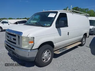 2009 Ford Econoline Cargo with VIN 1FTNE24W99DA45347, listed as a IAAI auction lot 42068121 with 301,292 mi miles. Bid and sale history available at carsss.com. Image 2.