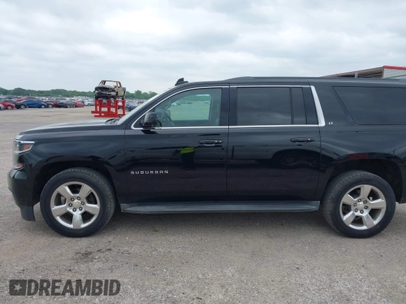 2016 Chevrolet Suburban LT with VIN 1GNSKHKC4GR233059, listed as a IAAI auction lot 42137869 with 115,571 mi miles. Bid and sale history available at carsss.com. Image 14.