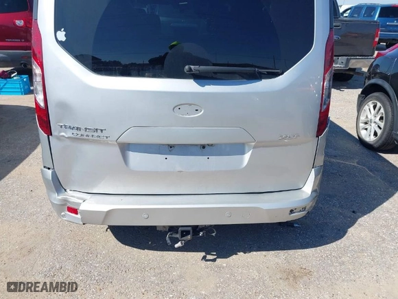 2015 Ford Transit Connect Wagon XLT with VIN NM0GE9F73F1176890, listed as a IAAI auction lot 41616697 with 128,674 mi miles. Bid and sale history available at carsss.com. Image 6.
