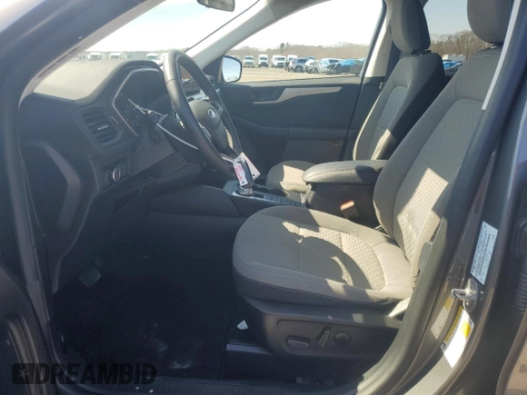 2022 Ford Escape SE with VIN 1FMCU9G64NUC01993, listed as a Copart auction lot 51331005 with 18,588 mi miles and Salvage title. Bid and sale history available at DreamBid. Image 7.