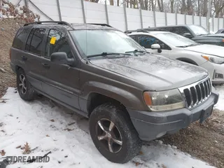2003 Jeep Grand Cherokee Laredo with VIN 1J4GW48S53C579106, listed as a IAAI auction lot 41432758 with 141,087 mi miles. Bid and sale history available at carsss.com. Image 1.