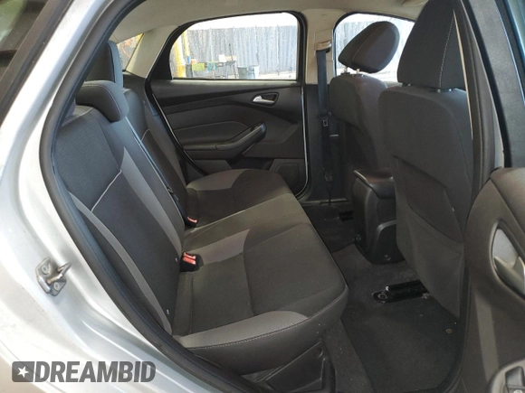 2013 Ford Focus SE z VIN 1FADP3F26DL314690, wystawiony jako Copart lot #58408575 z przebiegiem Nie podano mil oraz Szkoda całkowita • Salvage title. Historia ofert i sprzedaży dostępna na DreamBid. Obrazek 10.