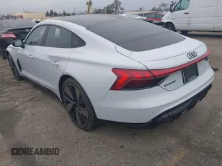 2023 Audi e-tron GT Prestige z VIN WAUEJBFW3P7004116, wystawiony jako IAAI lot #41771964 z przebiegiem 23 984 mil mil oraz . Historia ofert i sprzedaży dostępna na DreamBid. Obrazek 3.