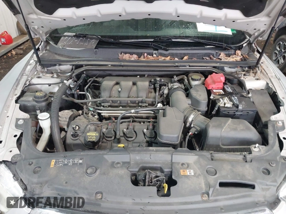 2014 Ford Taurus Limited with VIN 1FAHP2F81EG101351, listed as a IAAI auction lot 41662308 with 139,542 mi miles. Bid and sale history available at carsss.com. Image 10.