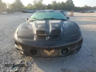 2000 Pontiac Firebird Formula z VIN 2G2FV22G4Y2175318, wystawiony jako Copart lot #68737224 z przebiegiem 229 394 mil mil oraz Szkoda całkowita • Salvage title. Historia ofert i sprzedaży dostępna na DreamBid. Obrazek 5.