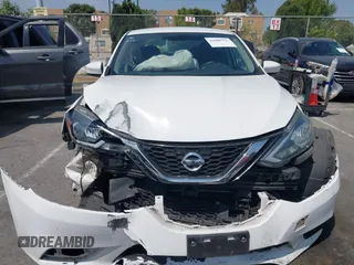 2018 Nissan Sentra S with VIN 3N1AB7AP6JY232812, listed as a IAAI auction lot 42088733 with 210,861 mi miles and . Bid and sale history available at DreamBid. Image 12.